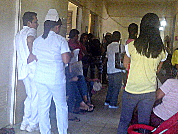 a crowd waits at the outpatient dept at guimaras provincial hospital